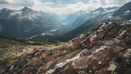 Rocky alpine valley trail symbol for summer adventure travel freedom in remote mountain range in canada or austria during warm daylight