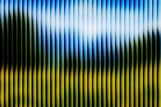 Abstract vertical stripes background with blue and yellow gradient lines texture, modern blurred motion effect, digital noise pattern, colorful graphic design wallpaper