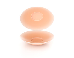 Nude self-adhesive silicone breast pasties isolated on white background. 3d illustration