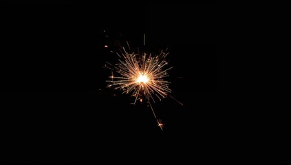 Sparkler burn set on a black background, safety precaution for handling pyrotechnics