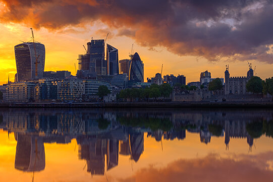London cityscape over river Thames with a dramatic sunset sky - Powered by Adobe