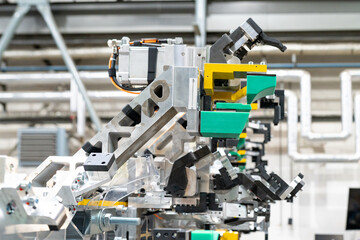 Automotive robotic arm working on industrial production line