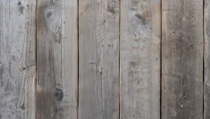 Naklejka premium Textured surface of aged gray wood, suitable for rustic backgrounds and layouts