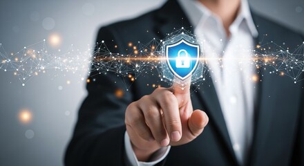 Businessman touching shield with lock icon, representing cybersecurity and data protection, internet technology and network security concept, protecting business and financial data