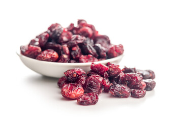 Tasty dried cranberries in bowl  isolated on white background.