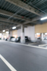 Fototapeta premium 立体駐車場の通路と矢印のぼかし背景素材