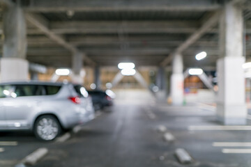 地下駐車場のぼかし背景｜ビジネス広告やテキスト配置に最適なデザイン素材