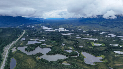 Discover breathtaking Alaskan wilderness with serene lakes and vast landscapes, perfect for adventure travel and stunning nature documentaries or tourism promotion © Salah Latreche