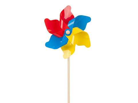Colorful pinwheel toy isolated PNG on transparent background, red blue and yellow paper windmill for kids and summer fun