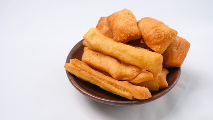 Golden Fried Dough Sticks in Wooden Bowl