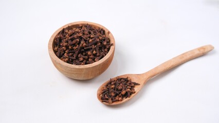 Aromatic Cloves: Culinary Spice on White Background