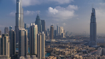 Dubai Downtown at sunrise timelapse. Aerial view over big futuristic city.