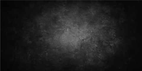 Dark grunge texture background of an old vintage black wall surface