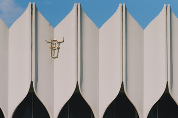 Minimal White Architectural Panels Against Blue Sky