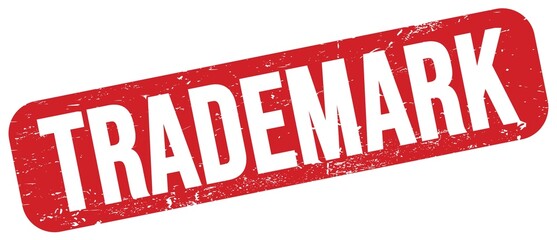 TRADEMARK text on red grungy stamp sign.