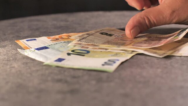 Bulgaria change currency, Bulgaria Lev to Euro. Money exchange. Paper banknotes on table. Concept, economy, competition, crisis, banking and finance. BGN,BGL. Scene A. man counting money.