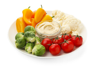 Different fresh vegetables and sauce isolated on white