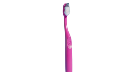 Pink scene showing toothbrush, pink, dental in modern environment with natural lighting for modern branding and lifestyle representation