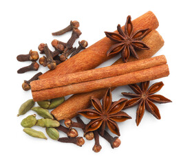 Mulled wine spices. Cinnamon sticks, anise stars, cardamon seeds and cloves isolated on white, top view