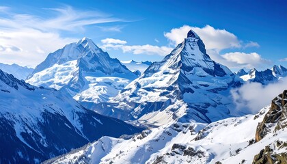 Jagged snow-capped peaks rise against a clear blue sky, accented with scattered white clouds and green trees below
