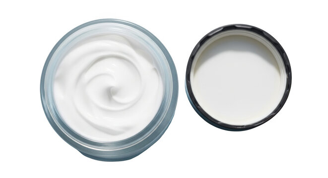 Two small containers with white cream or lotion, one open and one closed, isolated on transparent background