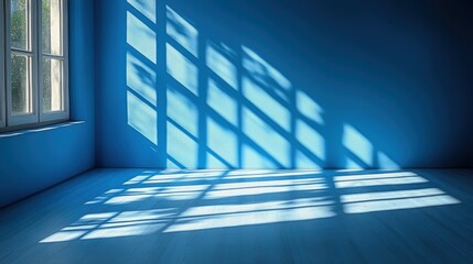 Obraz premium A serene blue room bathed in warm sunlight, creating a peaceful and inviting atmosphere. The natural light highlights the room's textures and colors.