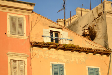 windows in old town of Rovinj with colorful wooden blinds
