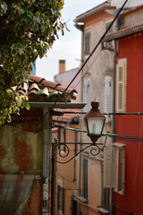 windows in old town of Rovinj with colorful wooden blinds