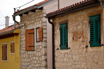 windows in old town of Rovinj with colorful wooden blinds
