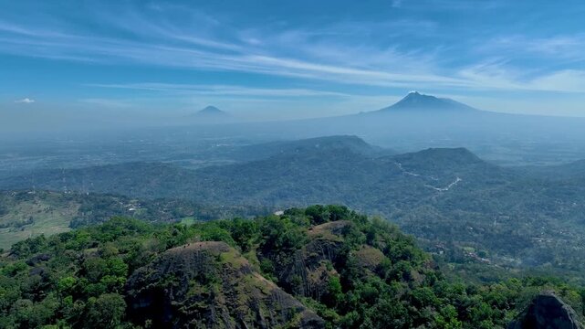 Drone Footage of Nglanggeran Ancient Volcano at Golden Hour Overlooking Merapi and Merbabu