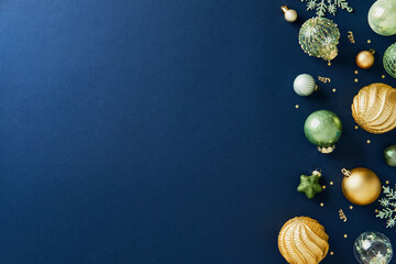 Elegant Christmas ornaments along the right border on a deep navy blue background.