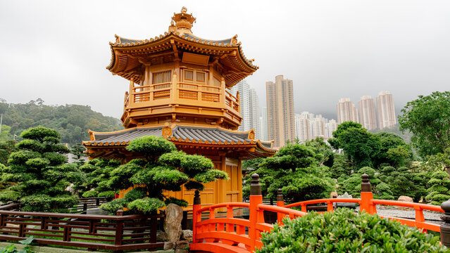 Nan Lian Garden pagoda amidst lush greenery and urban backdrop