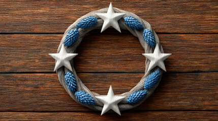 Diy christmas wreath with blue pine cones and white stars on wooden background for festive decoration and holiday spirit