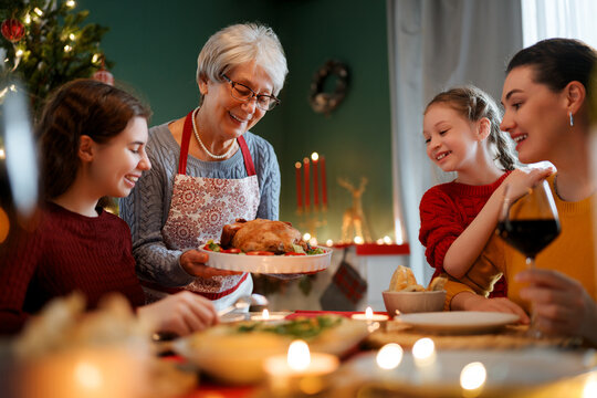 family celebrating Christmas - Powered by Adobe