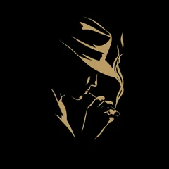 Elegant Smoker Silhouette: A refined silhouette of a person in a fedora, enjoying a moment of contemplation with a cigar, against a dark backdrop. The golden accents illuminate the scene. © Junior