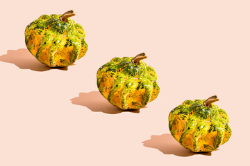 Festive pumpkins on a neutral background for Halloween