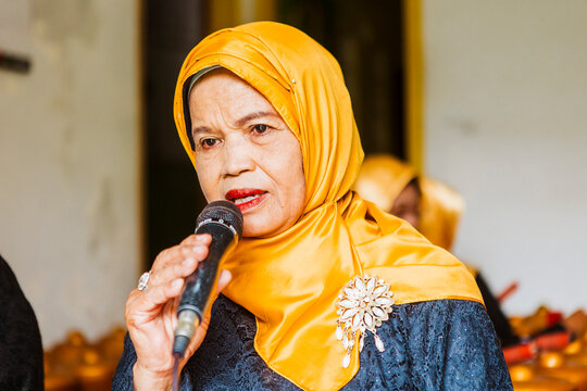 Woman singing in traditional Javanese music performance