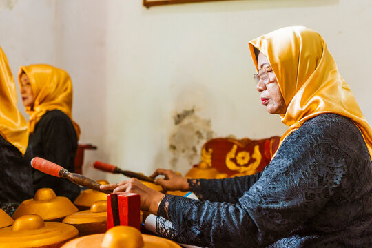Traditional Javanese music performance with gamelan