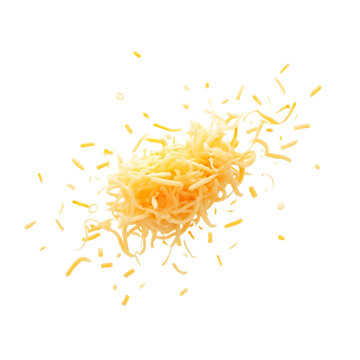 A close-up view of shredded cheese .