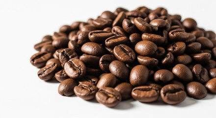Obraz premium A close-up shot of roasted coffee beans with rich brown tones and smooth, glossy surfaces.