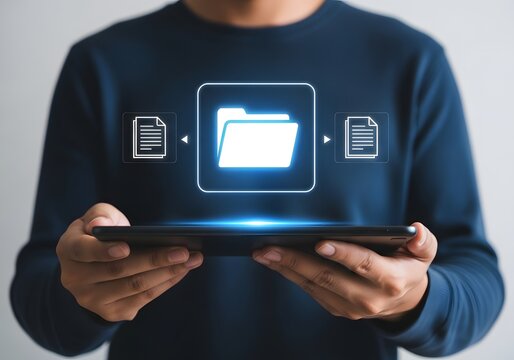 A person holding a tablet with digital document and folder icons floating above the device screen shown