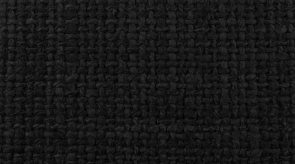 Black and Charcoal Coarse Weave Rugged Fabric. A deep, opaque black fabric with a heavy, coarse...