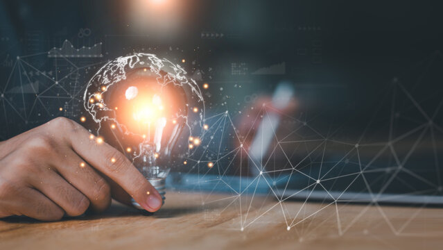 A glowing lightbulb with a digital world map represents global ideas, innovation, technology integration, smart solutions, and data connectivity for digital transformation and business growth.