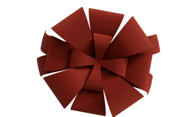 A vibrant, richly colored deep red decorative bow, seen from directly above, with intricate loops and folds casting shadows against a stark black background