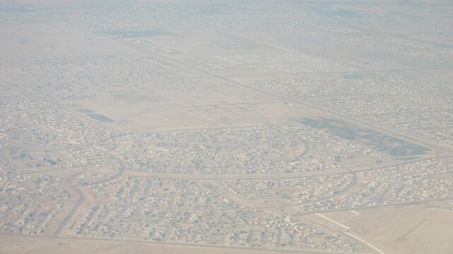 united arab emirates day time landscape flying aircraft window passenger pov panorama 4k uae