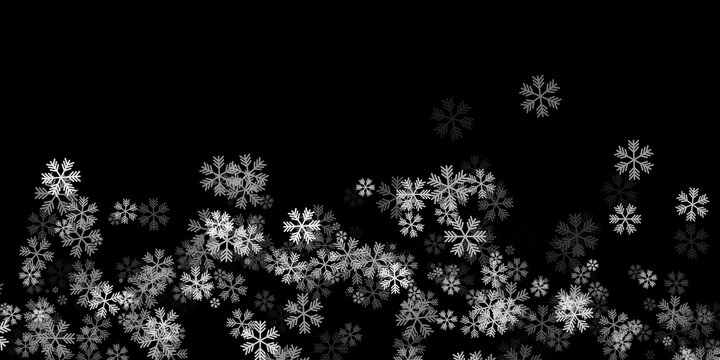 White falling snowflakes on dark black background snow overlay.