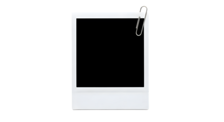 White instant photo frame with silver paper clip attached to the top right corner isolated on a transparent background