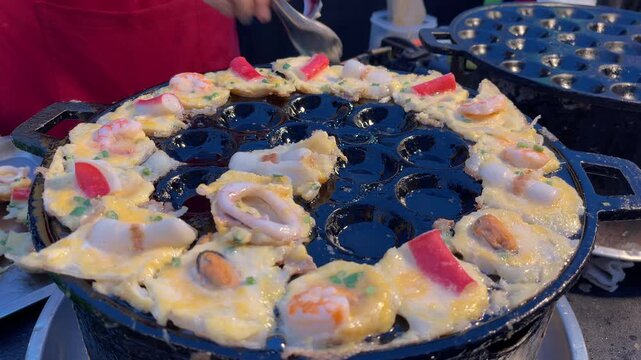 sunset time phuket town famous thai street food fried takoyaki close up 4k thailand