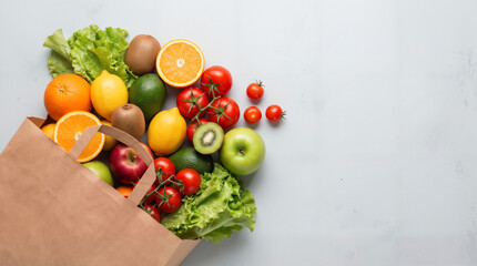 Fresh fruits and vegetables spilling from a brown paper grocery bag onto a grey concrete background