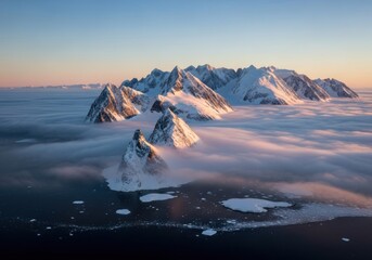 Majestic snow-capped mountains emerge from a sea of clouds